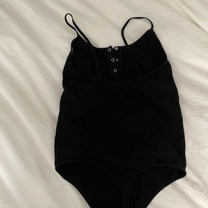 Black buttoned bodysuit